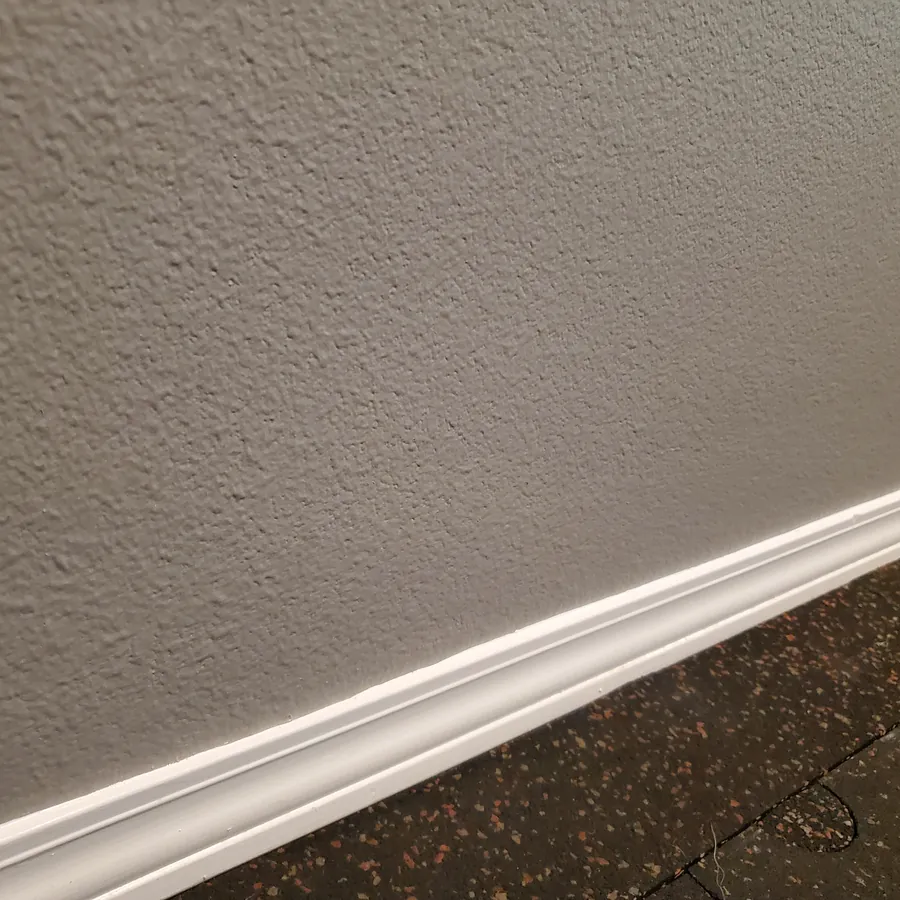 Baseboard up close after cleaning