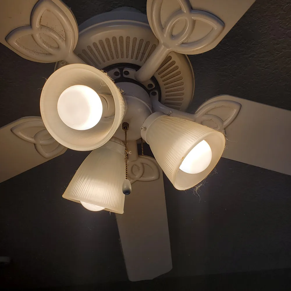 Ceiling fan before cleaning, dusty