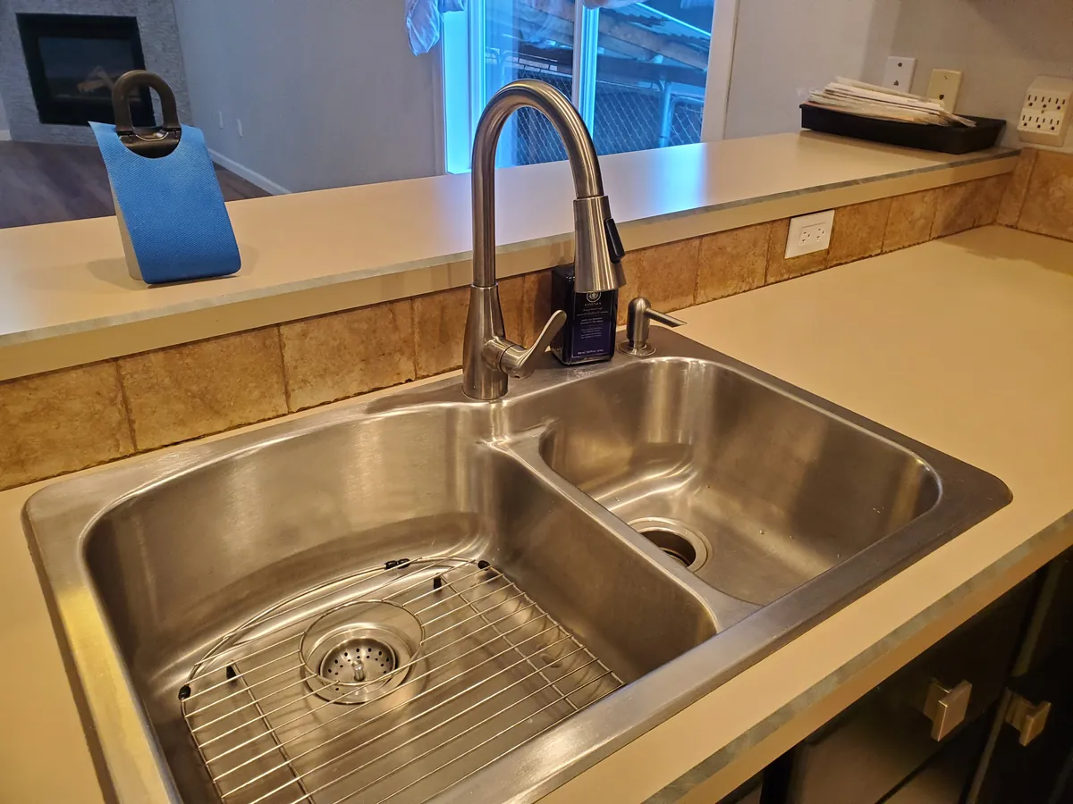 Stainless kitchen sink after cleaning, shining